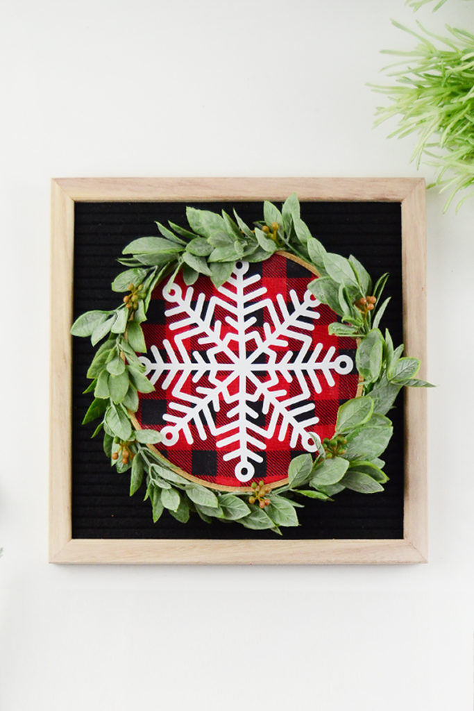 Embroidery Hoop Buffalo Plaid Mini Wreath | 50 Awesome DIY Yule Decorations and Craft Ideas You Can Make for the Winter Solstice