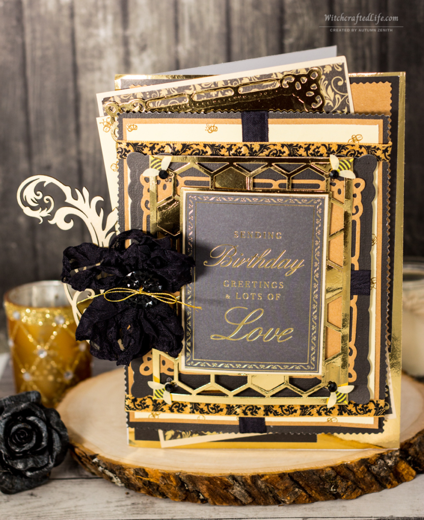 Photo of a handmade black, gold, and cream colour bee and honeycomb themed elegant masculine birthday card