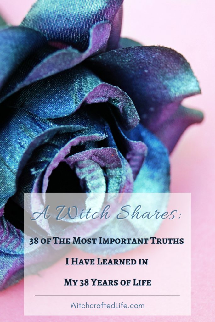 A Modern Pagan Witch Shares 38 of The Most Important Truths She Has Learned in 38 Years of Life - Image of a purple and blue rose on a pink background